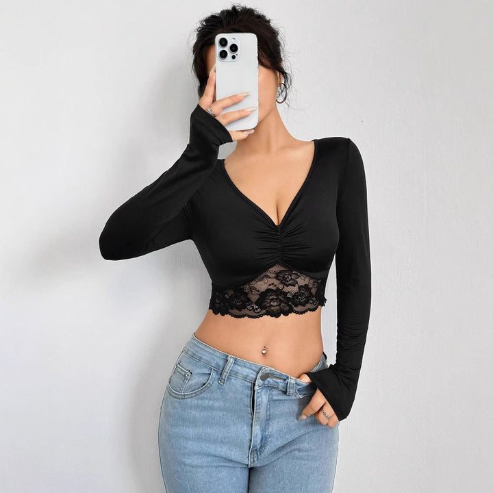 Ladies nan tailored long sleeve crop top with deep V-neck, gathering and lace hem Mune Fashion