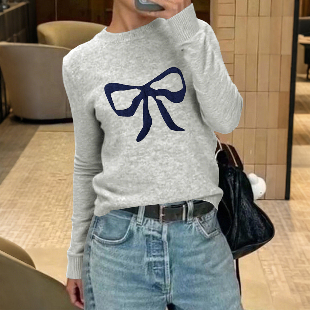 Women's fine knit pullover with large bow print, round neckline and slim fit Mune Fashion