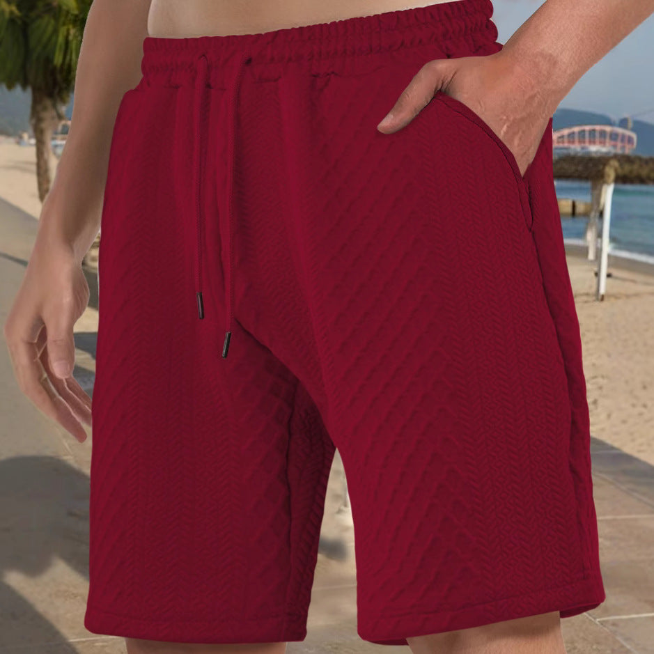 Men's textured beach bermuda shorts made of waffle jersey with elastic drawstring waistband and slanted pockets Mune Fashion