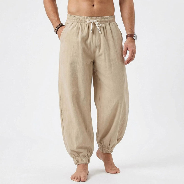 Men's relaxed harem pants made of linen blend with elastic drawstring waistband and gathered ankle closures Mune Fashion