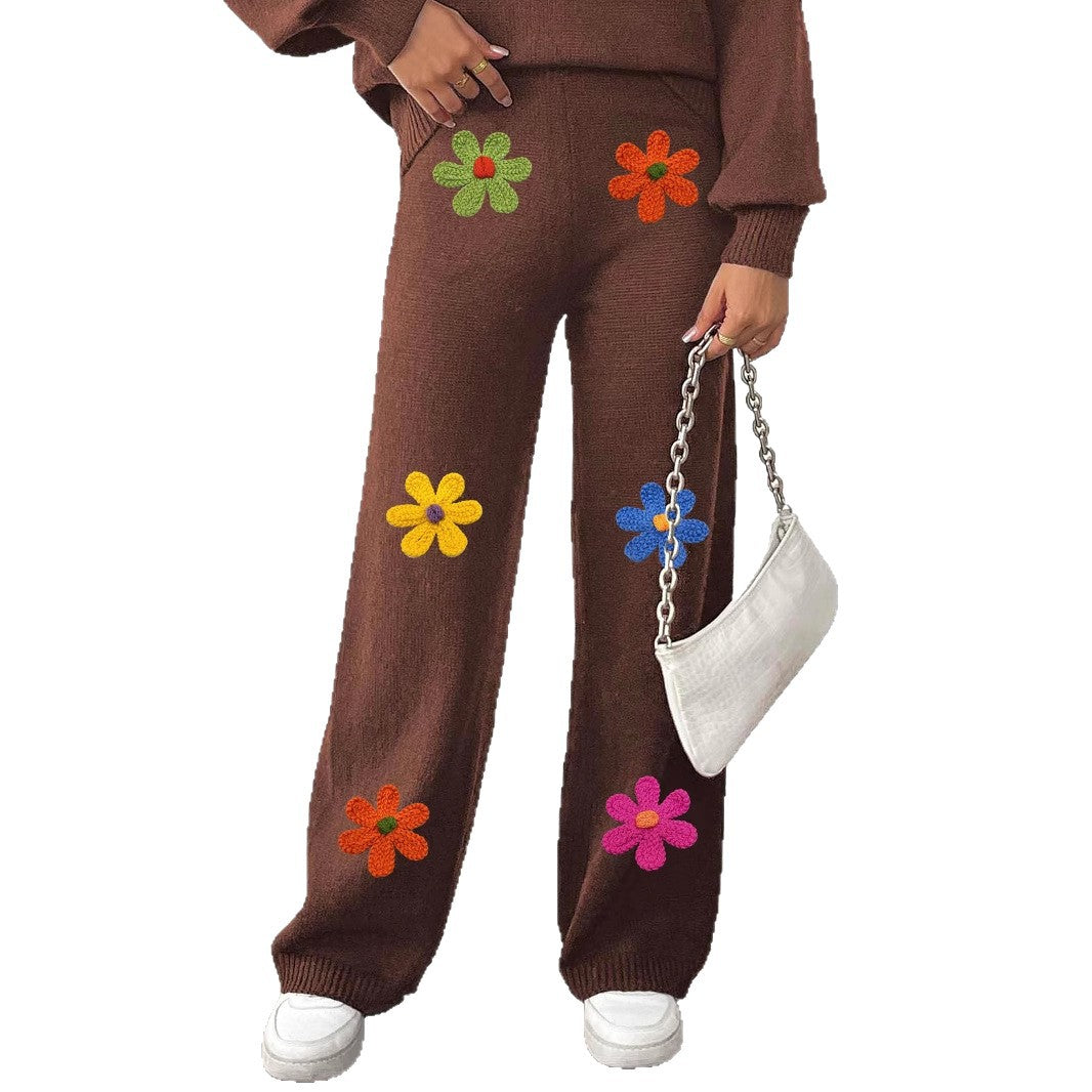 Women's casual knit pants with colorful floral appliqués Mune Fashion