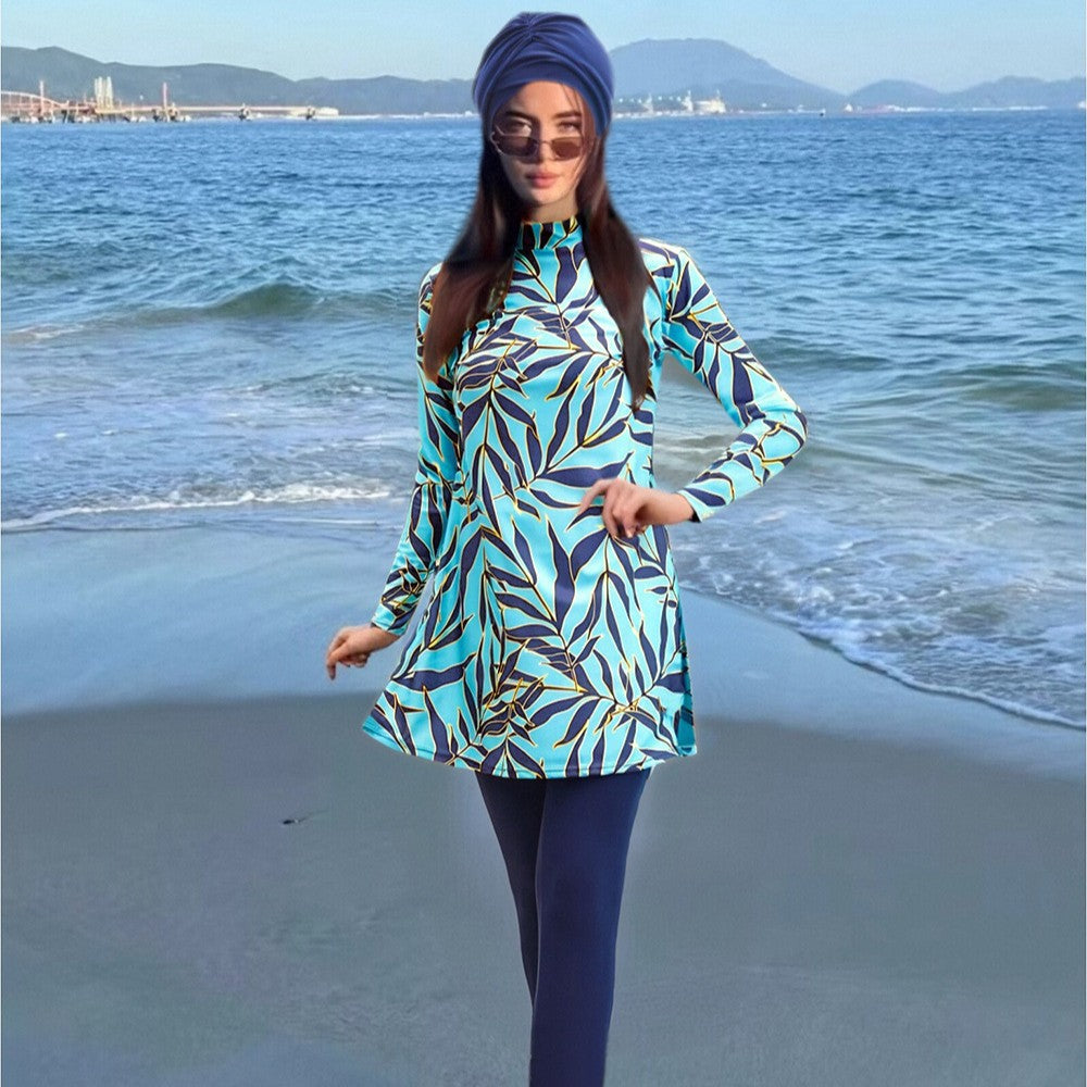 Women's fashionable UV protection swimsuit with long sleeves and asymmetric hem Mune Fashion