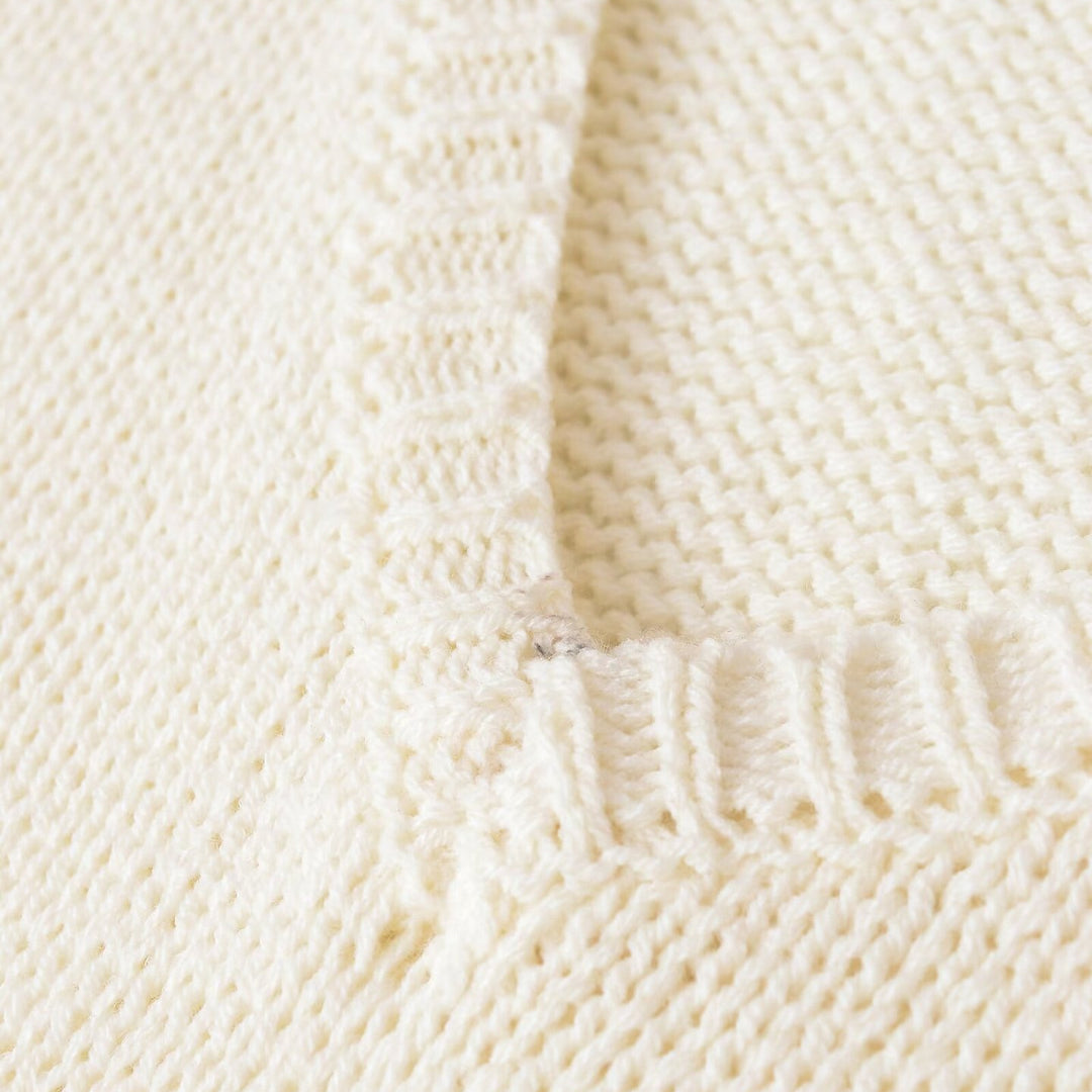 Women's chunky knit sweater with deep V-neck and oversized cut Mune Fashion
