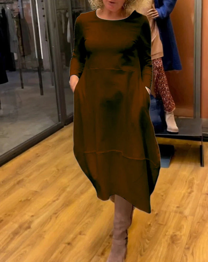 Women's asymmetrical balloon dress with three-quarter sleeves, side pockets, and flowing pointed hem Mune Fashion