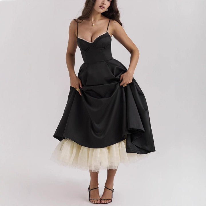 Ladies nan bustier dress with shaped bodice, soft flared skirt, integrated tulle underlay and side pockets Mune Fashion