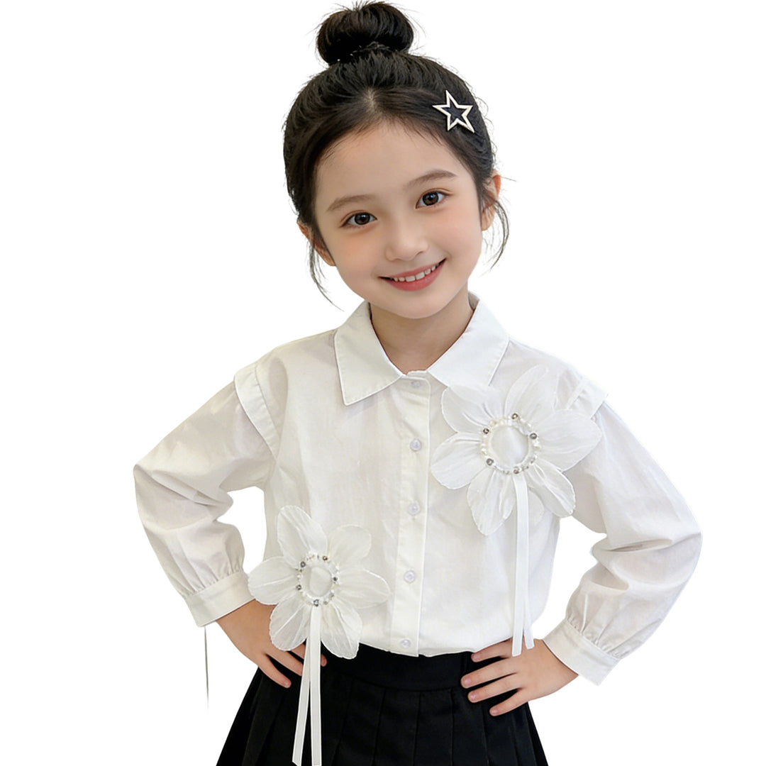 Girl's blouse with floral appliqués and elegant ruffle details Mune Fashion
