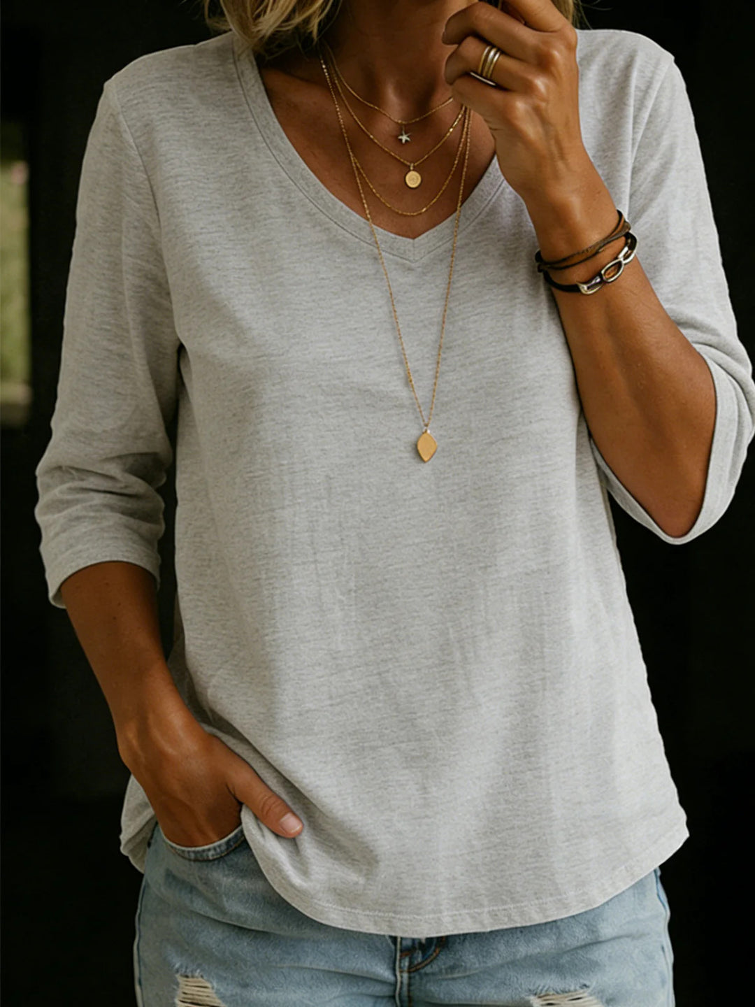 Women's Loose V-Neck Shirt with 3/4 Sleeves and Rounded Hem Mune Fashion