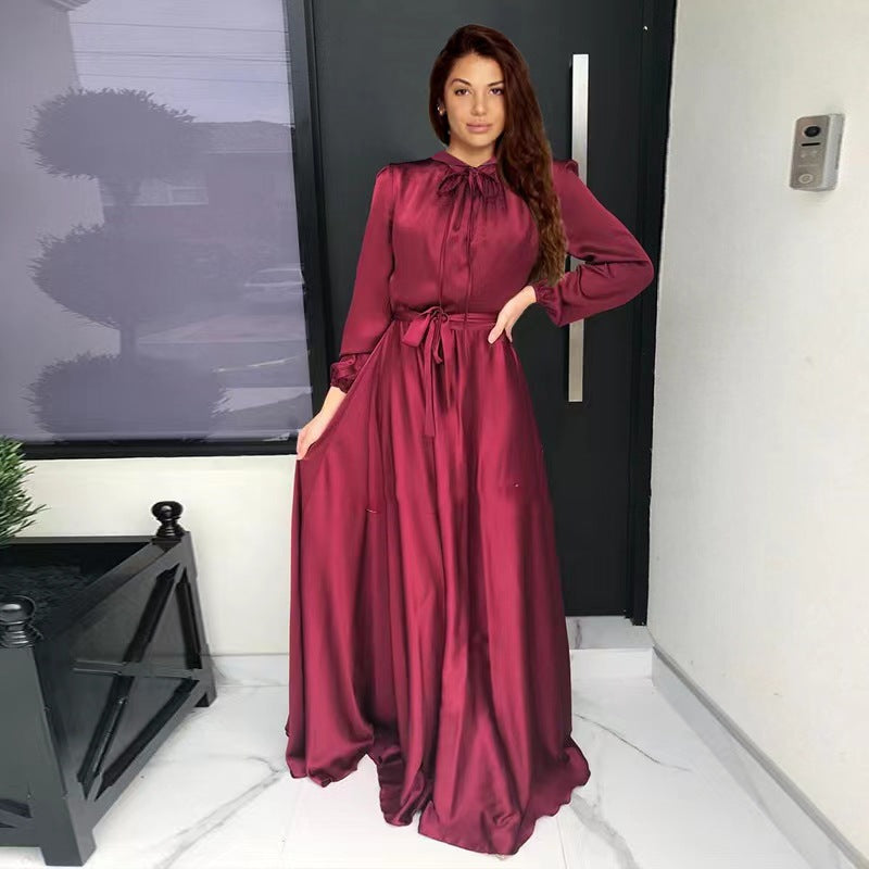 Women's maxi dress made of flowing satin with stand-up collar and tie belt Mune Fashion
