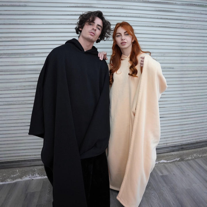 Unisex hooded poncho blanket with soft lining and generous oversized fit Mune Fashion