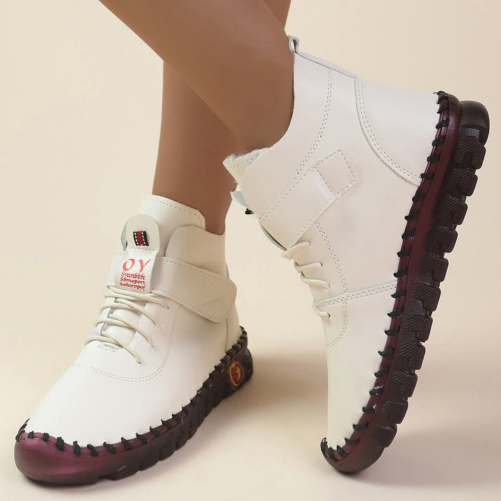 Women ankle-high comfort lace-up booties with Velcro closure and textured rubber outsole Mune Fashion