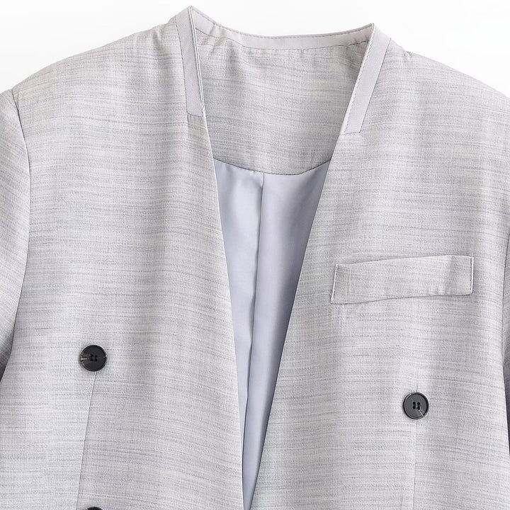 Women's cropped blazer without lapels with double-breasted button placket and boxy silhouette Mune Fashion