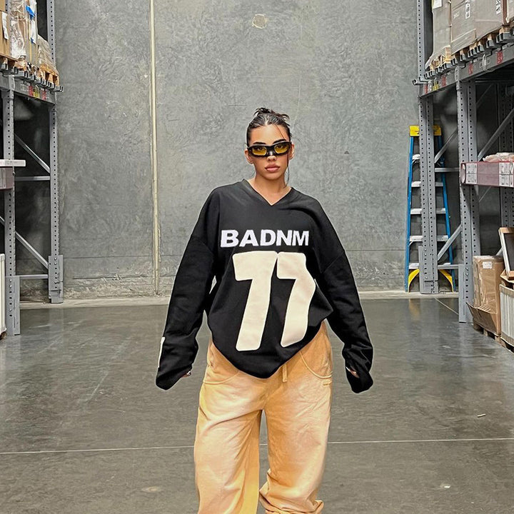 Damen Oversize Sport-Sweatshirt mit V-Ausschnitt und Statement-Print Mune Fashion