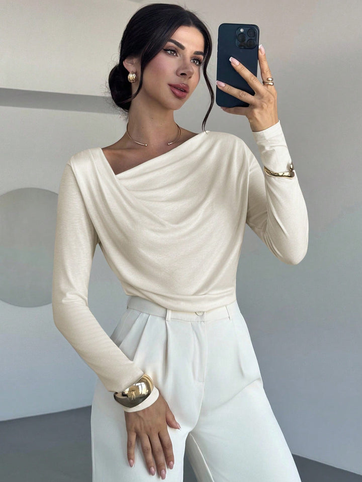 Women's elegant draped long sleeve top with waterfall collar and tailored silhouette Mune Fashion