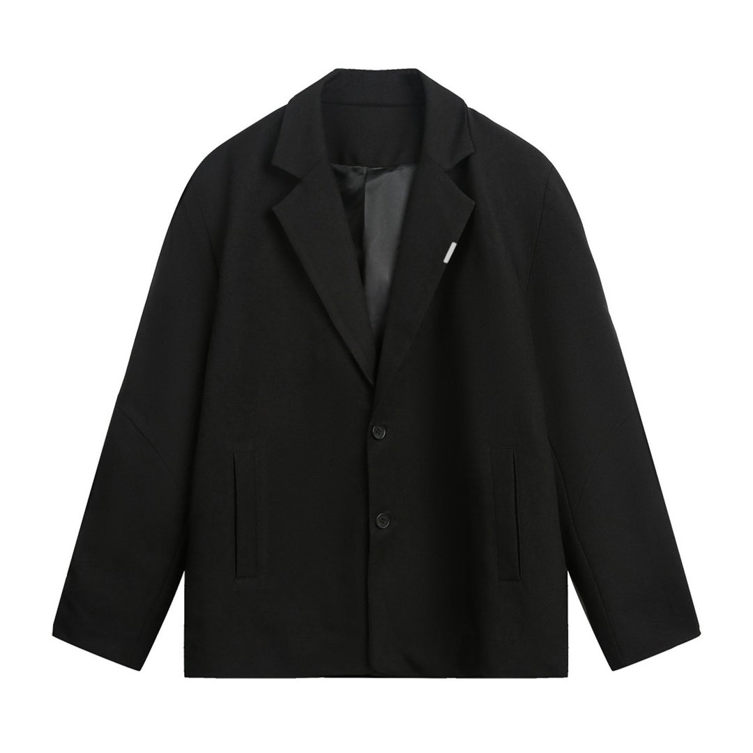 Unisex Boxy Blazer in oversized cut with lapel collar and discreet button closure Mune Fashion