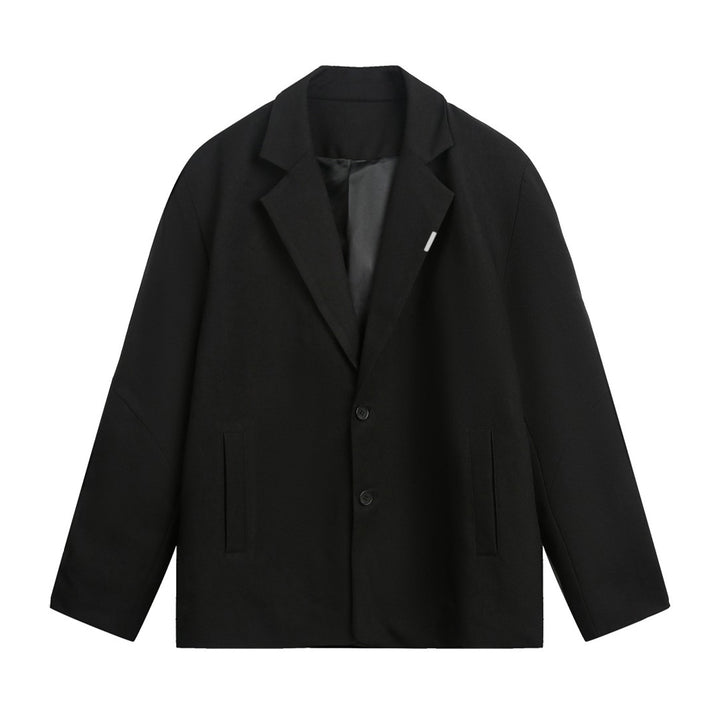Unisex Boxy Blazer in oversized cut with lapel collar and discreet button closure Mune Fashion