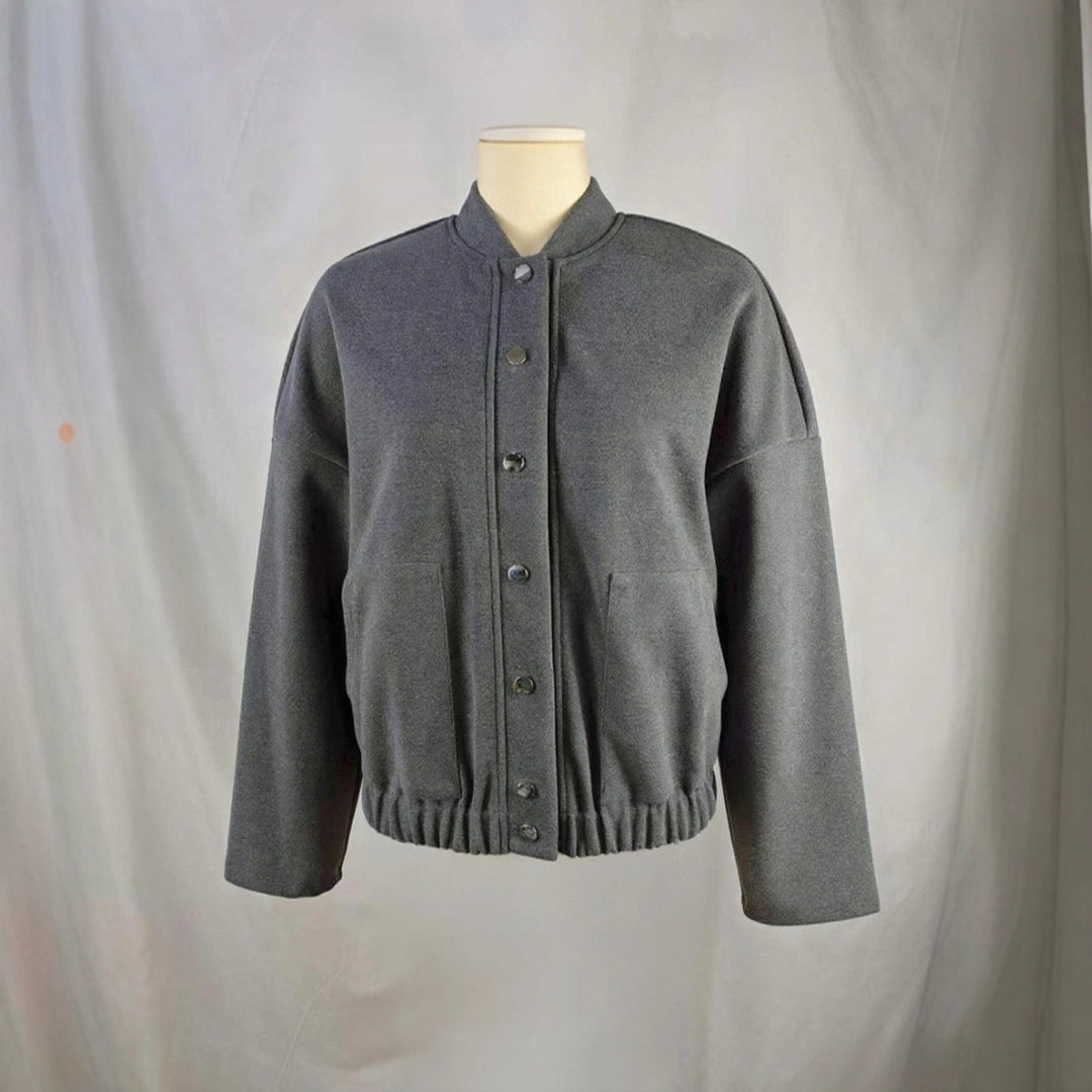 Women's cozy fleece bomber jacket with stand-up collar, ribbed hem, and snap button placket Mune Fashion