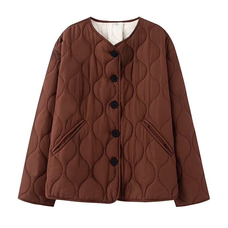 Women's quilted jacket without collar with round neckline, boxy cut and decorative wave quilting Mune Fashion
