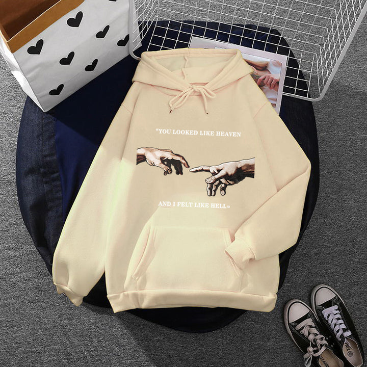 Women's oversized hoodie with kangaroo pocket and Renaissance hand design, soft fleece lining Mune Fashion