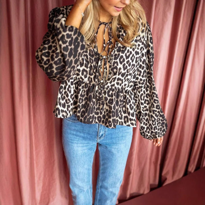 Women’s blouse with leopard print, tie bands and balloon sleeves Mune Fashion