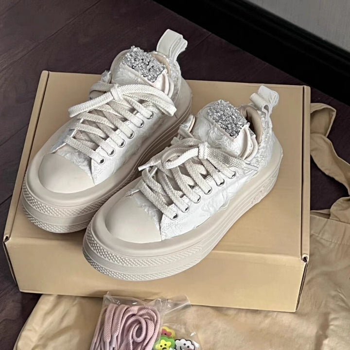 Women's sneakers with glittering appliqués and raised platform Mune Fashion