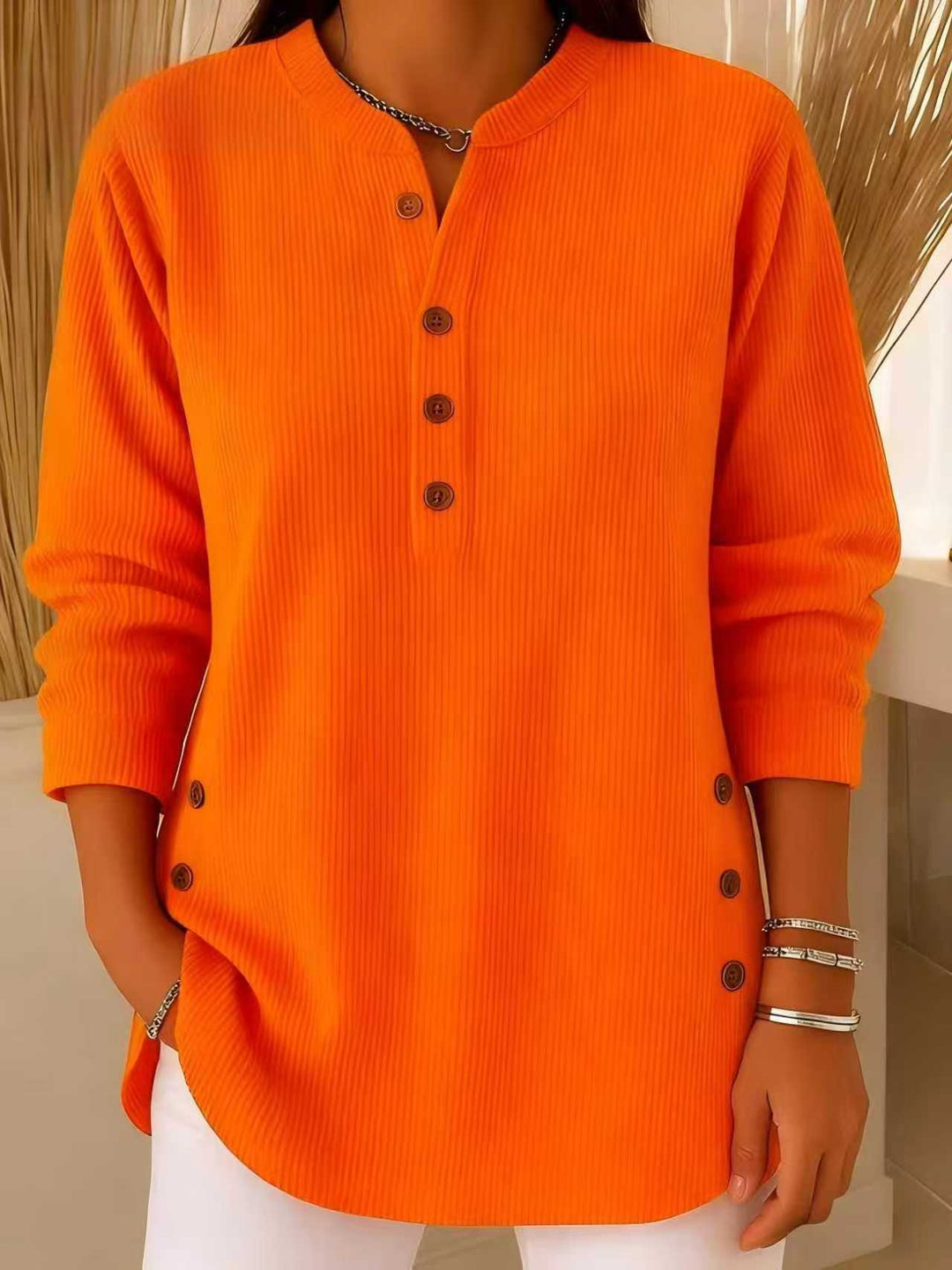 Women's plisse tunic blouse with stand-up collar, button placket and side decorative buttons Mune Fashion