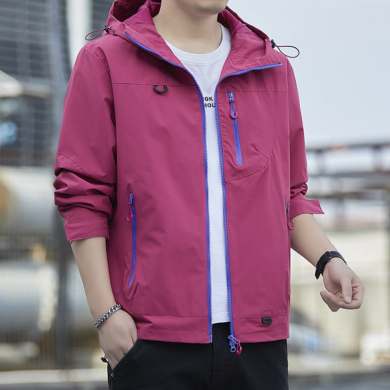 Men's lightweight Urban softshell hoodie jacket with contrasting zippers, chest pocket, and adjustable drawstring hem Mune Fashion