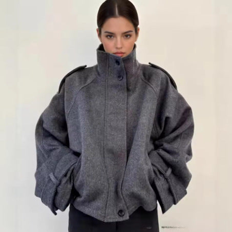Women's short wool jacket with stand-up collar, shoulder flaps, concealed button placket, and adjustable cuffs Mune Fashion
