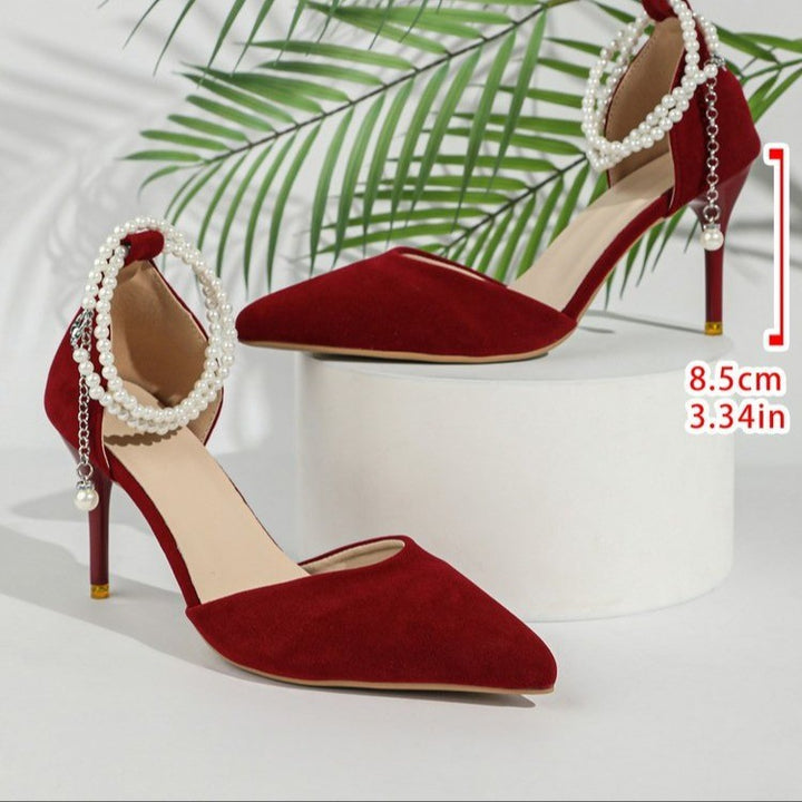 Women Elegant pointed heels with pearl ankle straps and slim stiletto heel