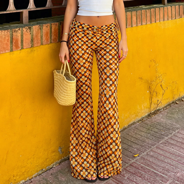 Women's flared high-waisted trousers with side drawstrings and retro floral print Mune Fashion