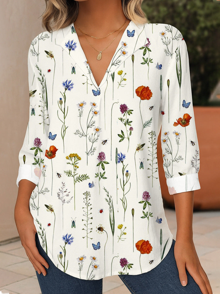 Women's Floral V-Neck Tunic Blouse with Three-Quarter Sleeves and Rounded Hem Mune Fashion