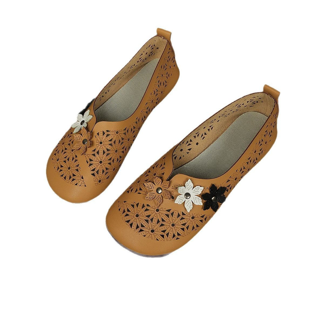 Ladies' flat ballerina slippers with laser perforation and three-dimensional flower appliqué Mune Fashion