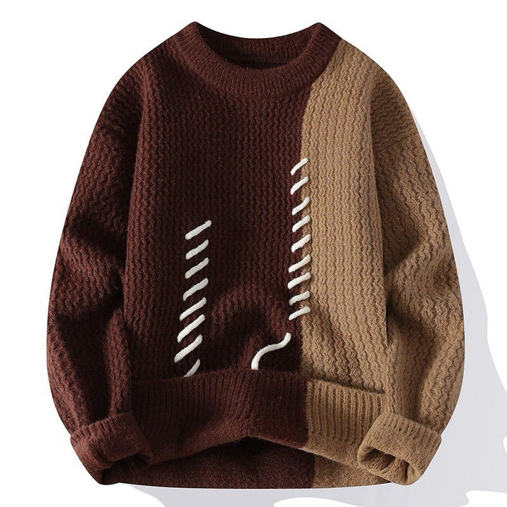 Unisex oversized knit sweater with cable pattern and decorative stitching Mune Fashion