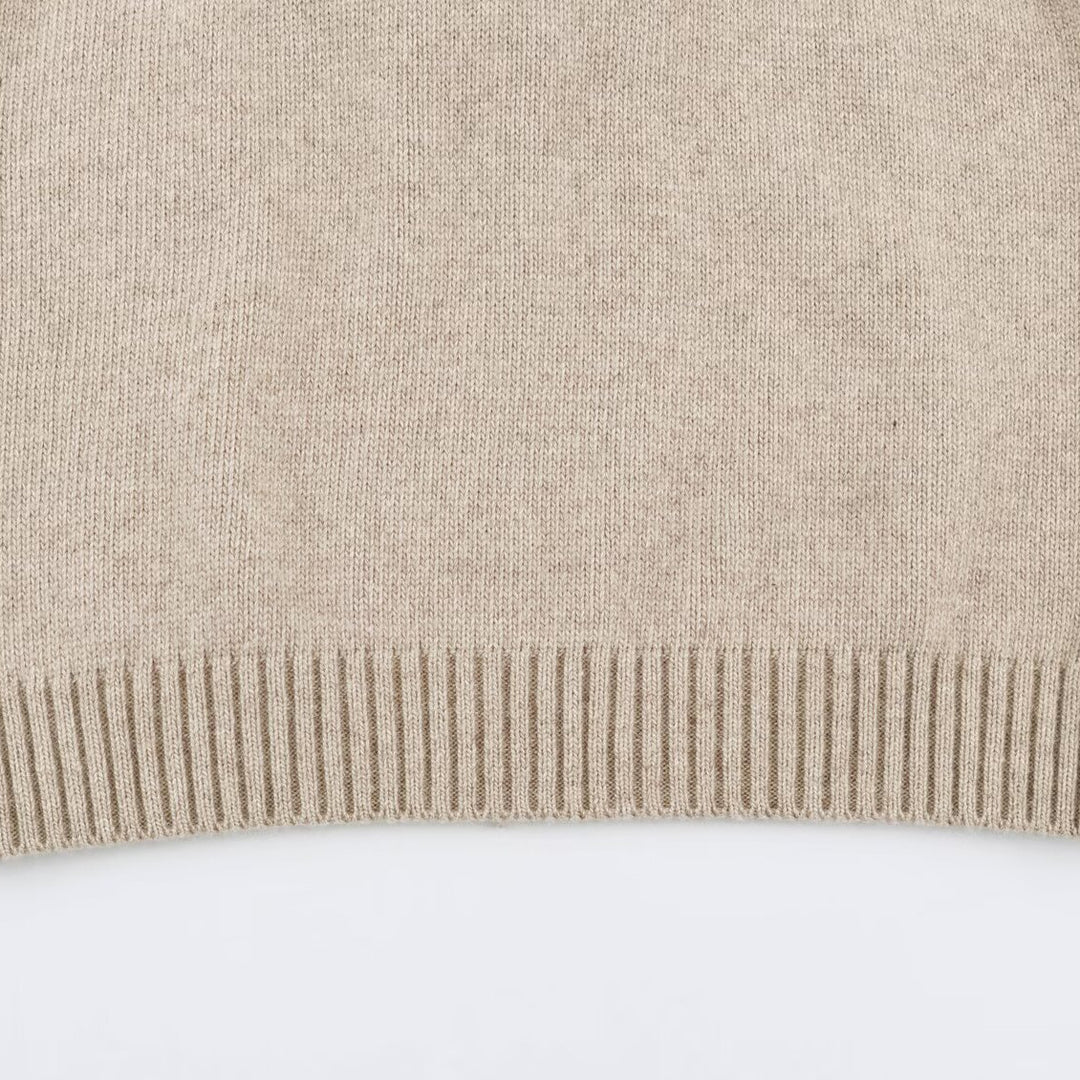 Women's fine knit vest with hood, button placket, and ribbed waistband Mune Fashion