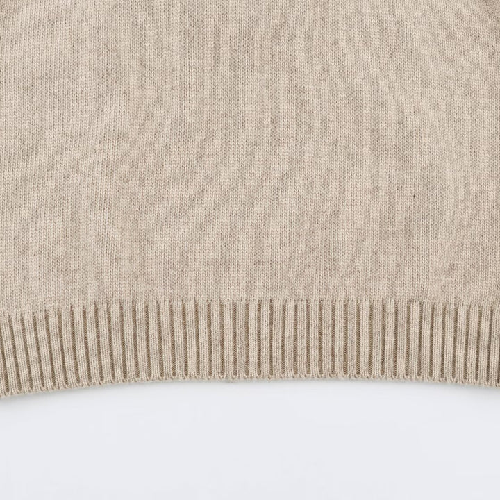 Women's fine knit vest with hood, button placket, and ribbed waistband Mune Fashion