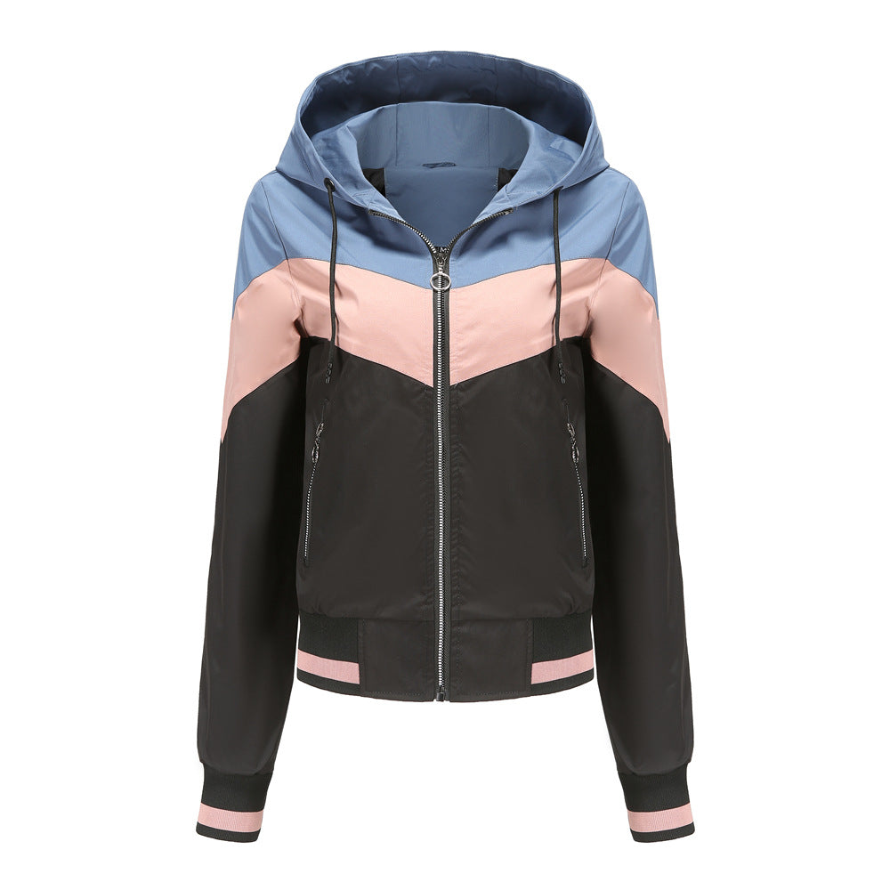 Women's lightweight windbreaker jacket with hood, block panel design, zippered pockets, and elastic hem Mune Fashion