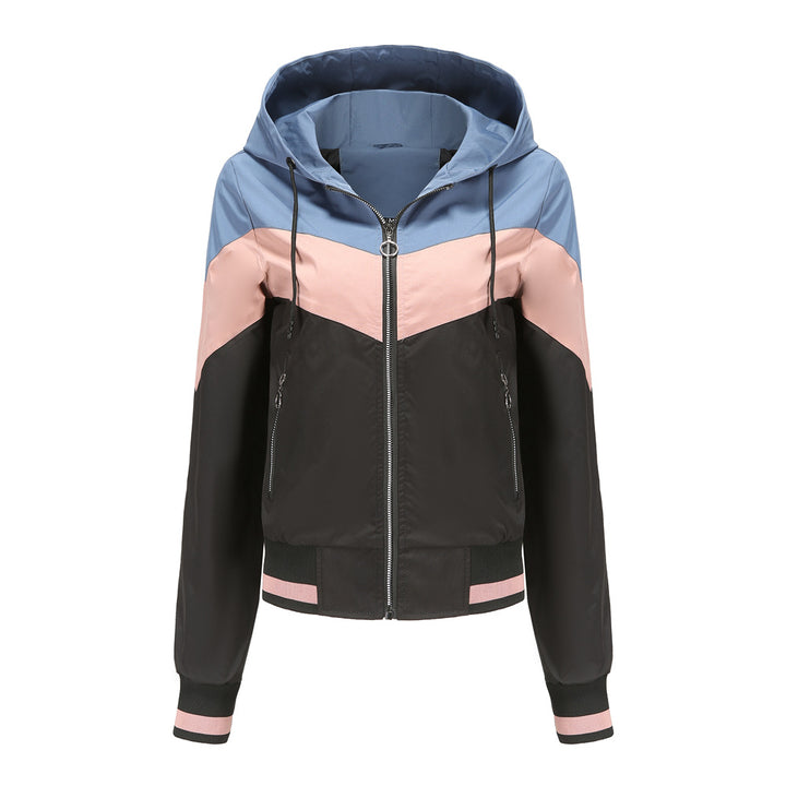Women's lightweight windbreaker jacket with hood, block panel design, zippered pockets, and elastic hem Mune Fashion