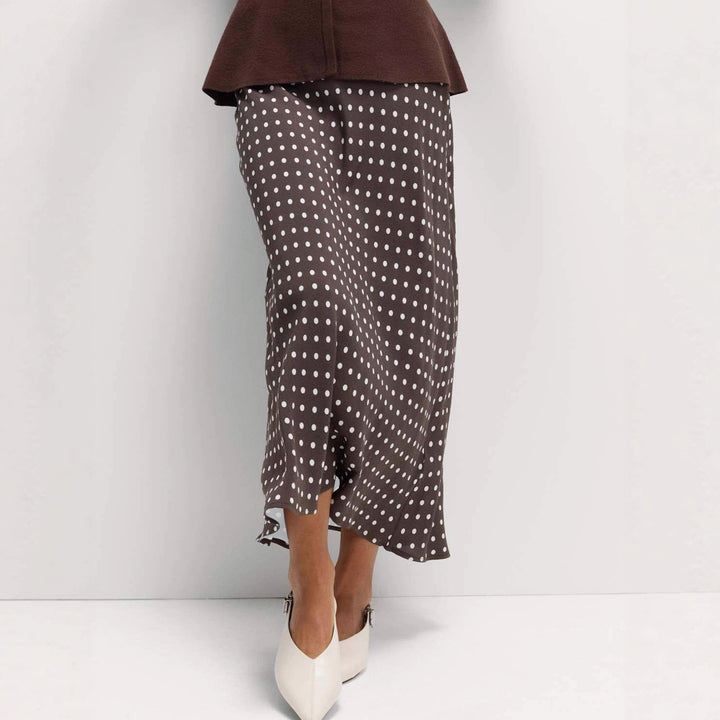 Women's midi skirt with polka dot pattern, asymmetrical hem and side slit Mune Fashion