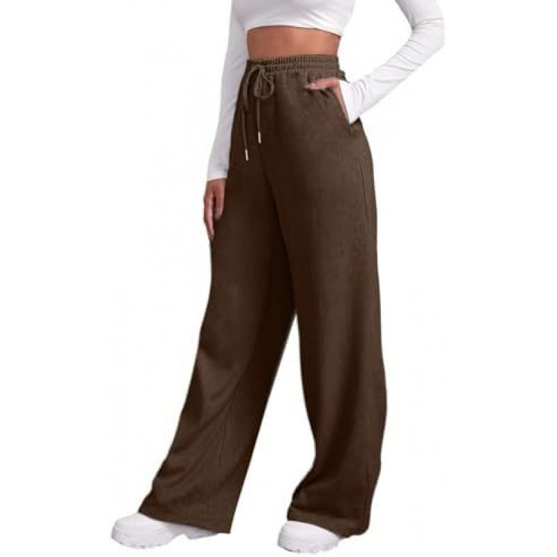 Women's flowing high-waist palazzo lounge pants made of lightweight jersey with elastic waistband and practical side pockets Mune Fashion