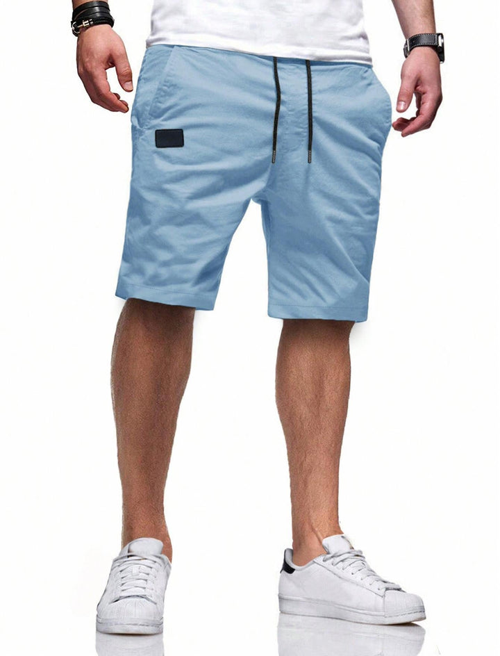 Men's comfortable sports shorts with practical pockets and elastic waistband Mune Fashion