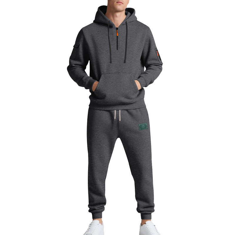 Men's half-zip hoodie and tapered jogger set with kangaroo pocket, zipper details, and elastic drawstring waistband Mune Fashion