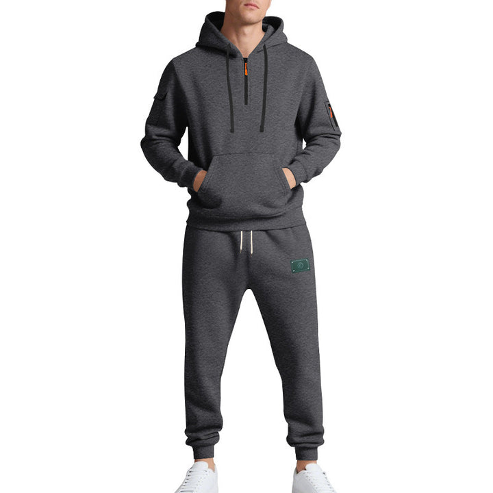 Men's half-zip hoodie and tapered jogger set with kangaroo pocket, zipper details, and elastic drawstring waistband Mune Fashion