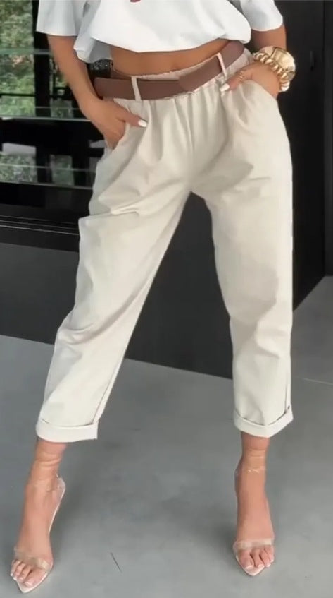 Women's high-waisted paperbag pants with gathered waistband, side pockets, and rolled hem Mune Fashion