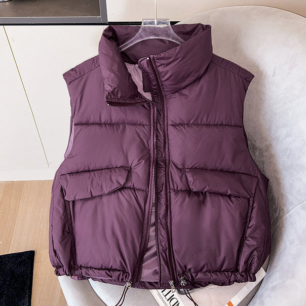 Ladies nan short insulating microfiber quilted vest with high stand-up collar, flap patch pockets and adjustable drawstring hem Mune Fashion