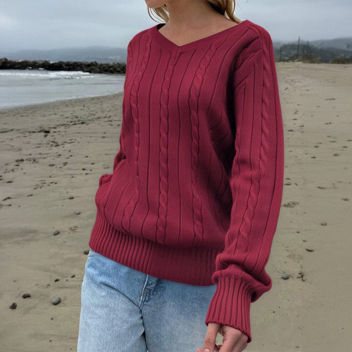 Women's fine textured knit sweater with V-neck, cable pattern and ribbed hem Mune Fashion