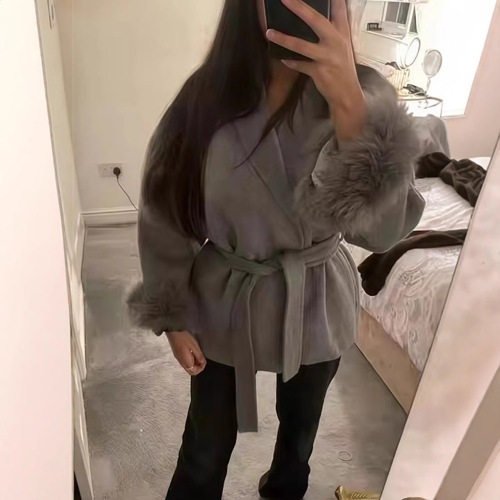 Women's fitted coat with belt tie, shawl collar and voluminous faux fur cuffs Mune Fashion