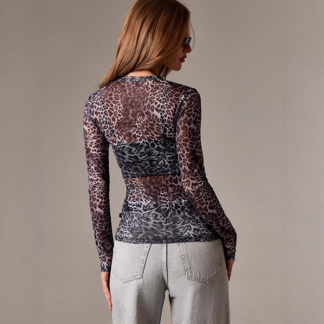 Ladies' fine mesh shirt with all-over animal print, tailored cut and round neckline Mune Fashion
