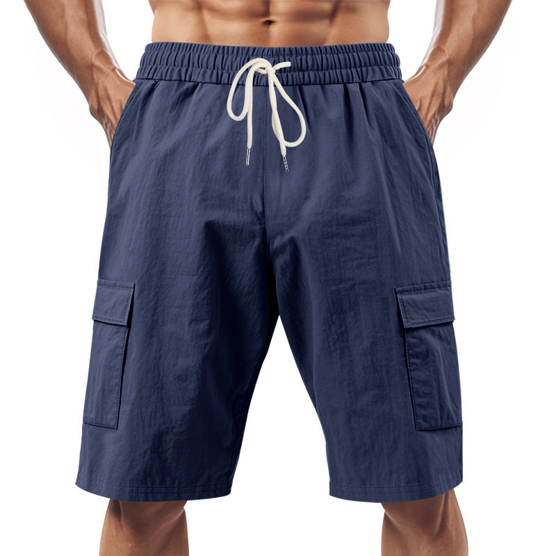 Men's technical cargo shorts with elastic drawstring waistband, secure flap pockets, and quick-drying functional material Mune Fashion
