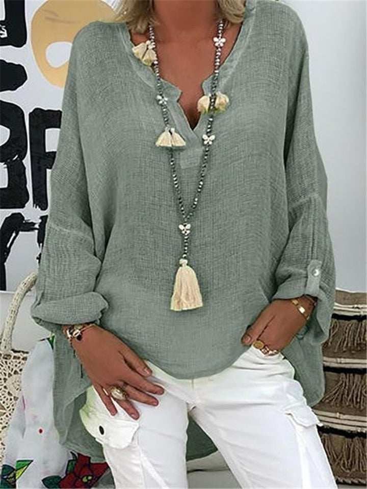 Ladies' nano structured cotton tunic in a loose fit with V-neck, rolled sleeves, and extended back hem Mune Fashion
