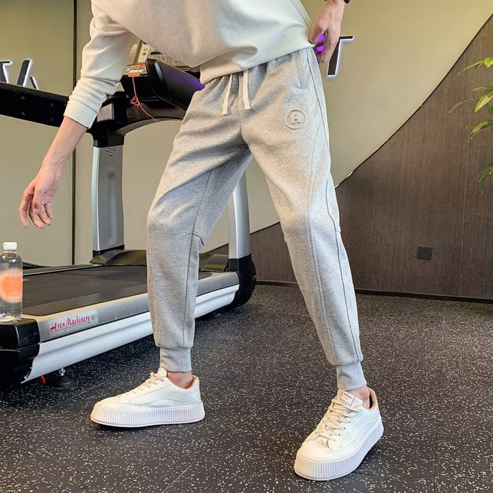 Men's Slim-Tapered Jogging Pants made of Cotton Blend with Cuffs, Drawstring, and Subtle Logo Application Mune Fashion