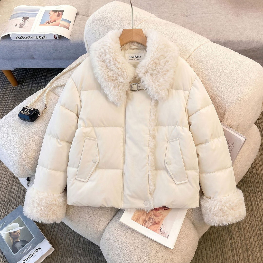 Women's fitted quilted jacket with voluminous teddy collar and detachable pom-pom details Mune Fashion